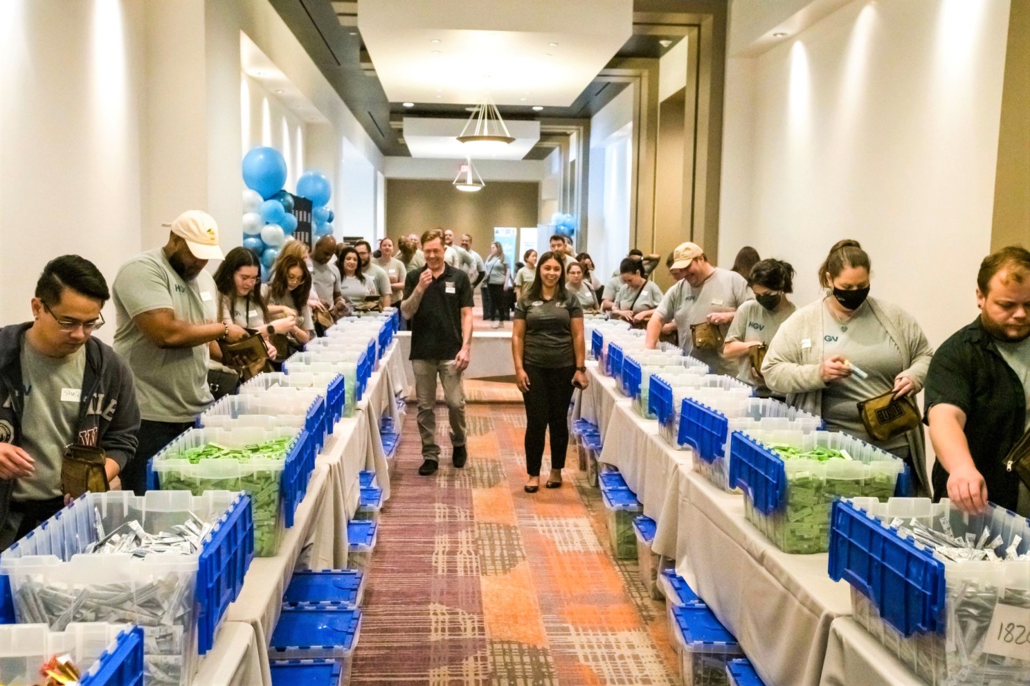 HGV Team Members assemble care packages for deployed service members with the USO.