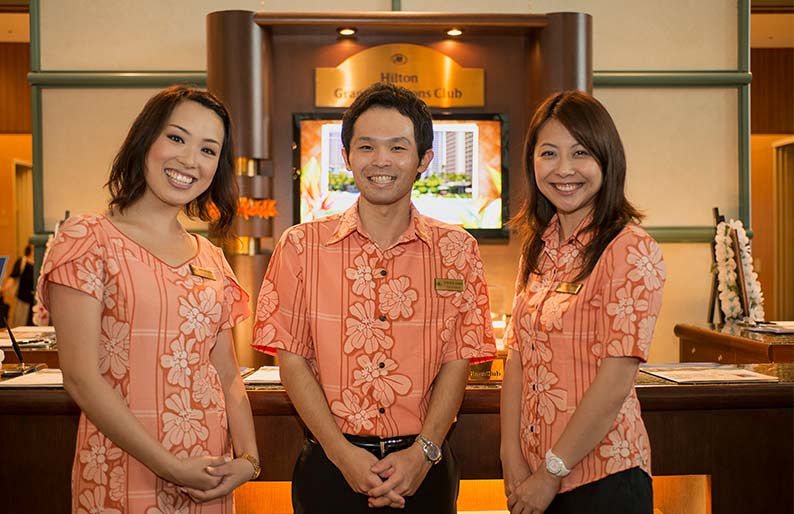 Smiling Asian HGV team members