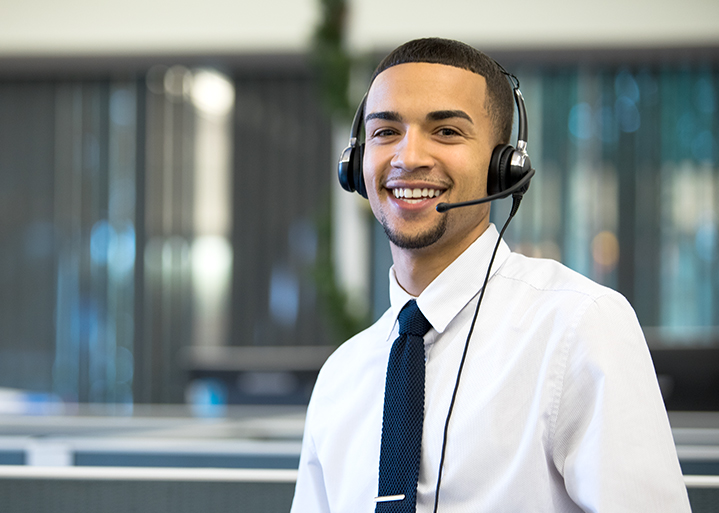 african-american team member with telephone headset