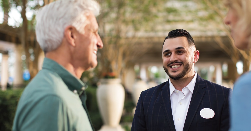 HGV team member speaking with guest